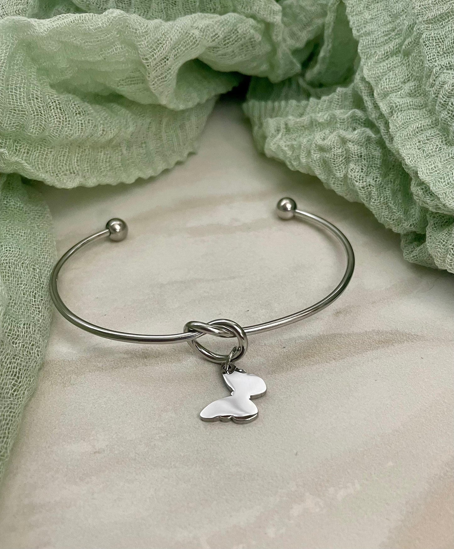 Knot Bracelet with Butterfly Charm