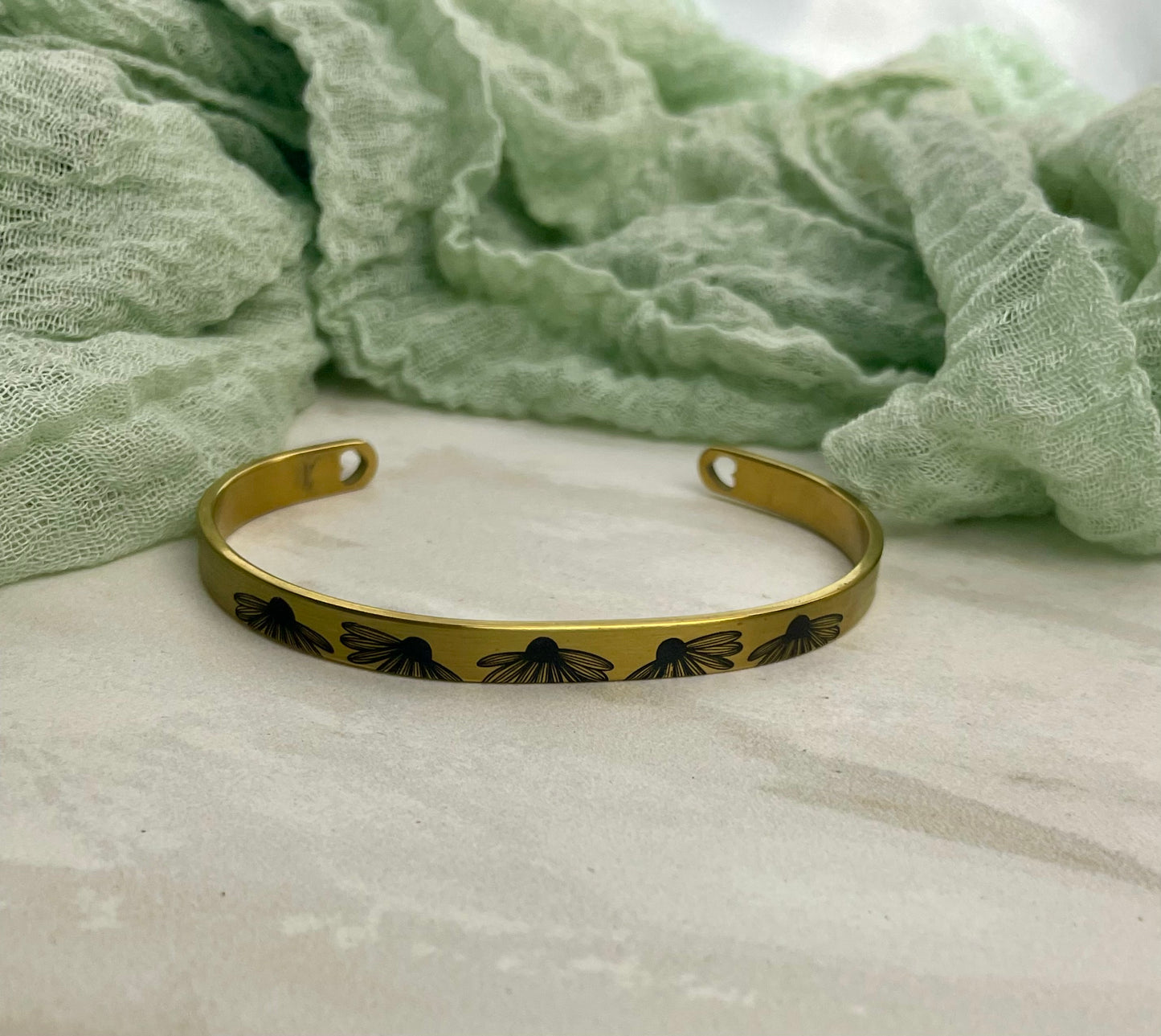 Gold Cuff Bracelet with Heart Cutouts Daisy Engraving